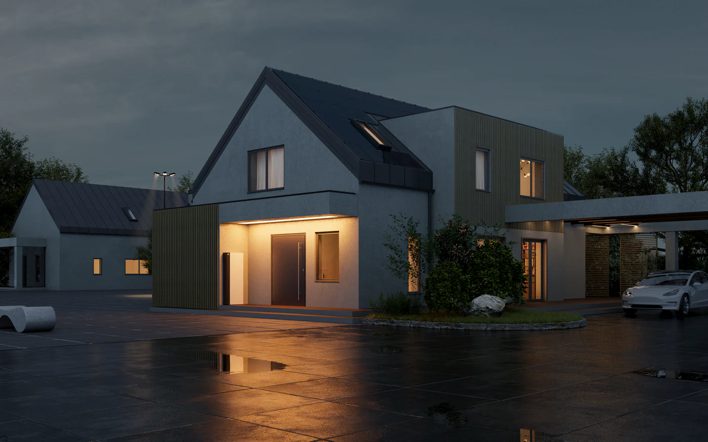 Modern home with battery system at night